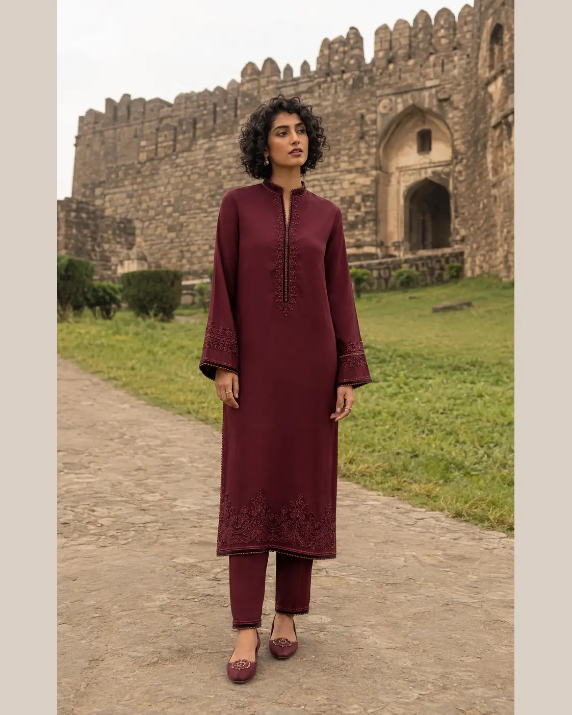 Model wearing Saira burgundy straight set